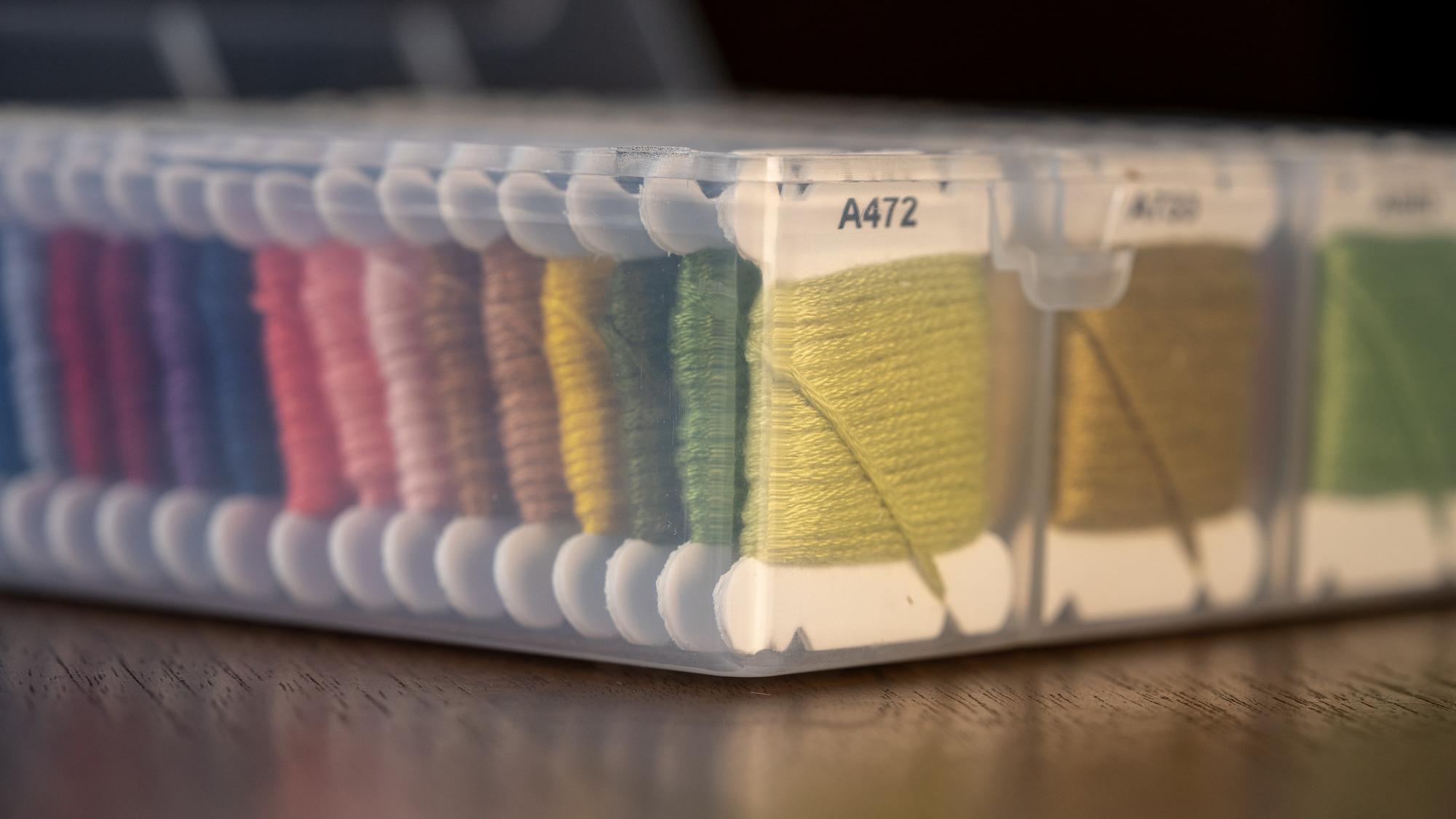 stack of stitched swatches and price sheet